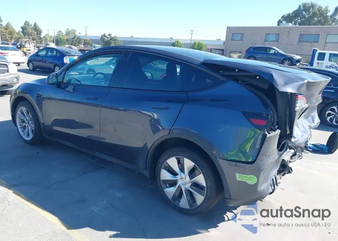 2022 Tesla Model Y Long Range Dual Motor All-Wheel Drive z USA, uszkodzony, nr VIN 7SAYGDEEXNF572277